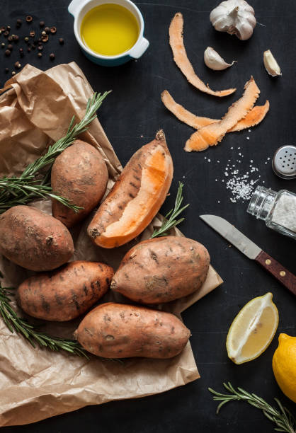 istock Preparing rosemary roasted sweet potatoes captured from above (top view) 1131831876