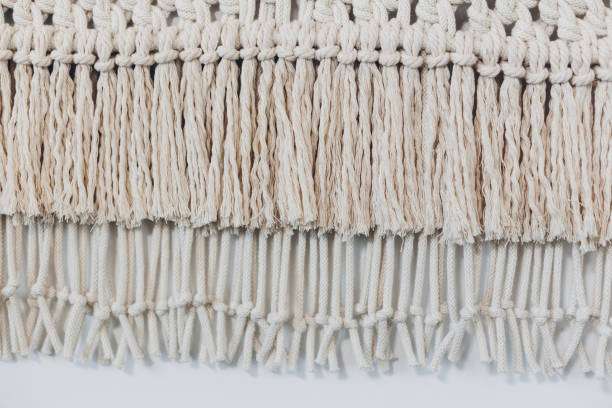 istock Detail of macrame decor displayed hanging on a wall. 1131833141