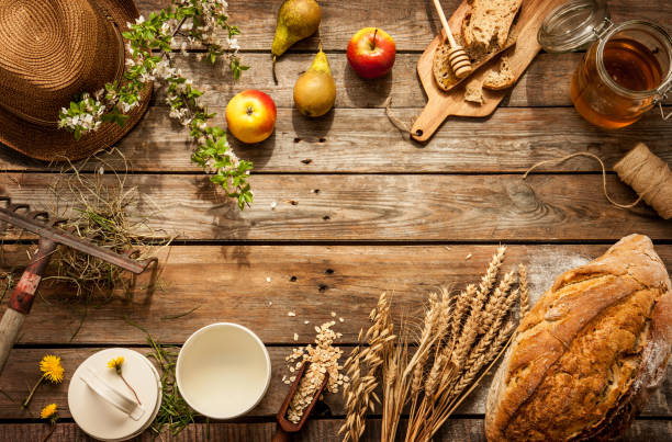 Country lifestyle, rural vacation or agritourism concept Natural local food products on vintage wooden table - rustic composition captured from above. Country lifestyle, rural vacation or agritourism concept. Background layout with free text space. agritourism stock pictures, royalty-free photos & images