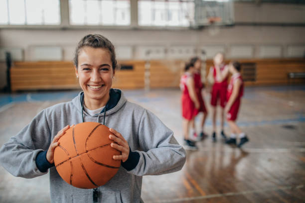 istock Female coach and basketball team 1131834466