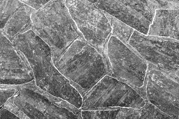 pattern of old irregular stones at a porch