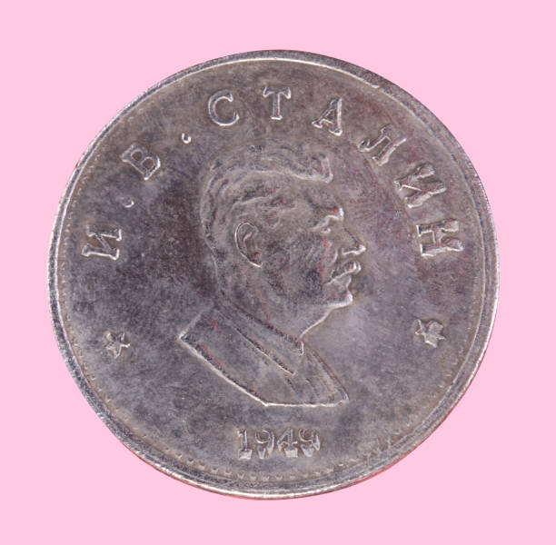 istock Russian coin 1 ruble 1949 CCCP isolated on pink 1131840124