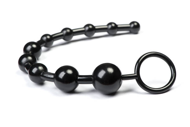 Black anal sex toy balls - fotografia de stock