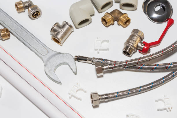 istock plumbing tools and equipment on white with copy space 1131846616