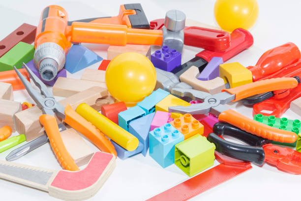 istock Toy tools and cubes on a light background. Toy for children 1131846638