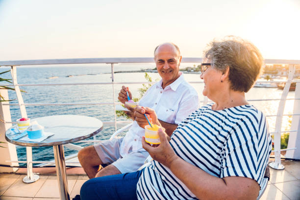 istock Senior couple eating ice cream 1131846737