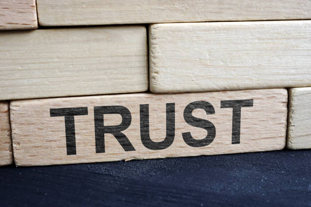 istock Trust and relationship concept. Wall from wooden bricks. 1131847692