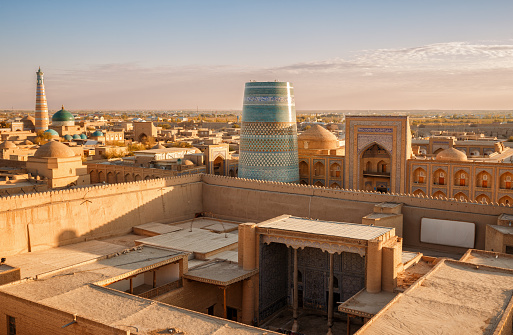 Top view of old city of Khiva, Ichan-Kala fortress at sunset
