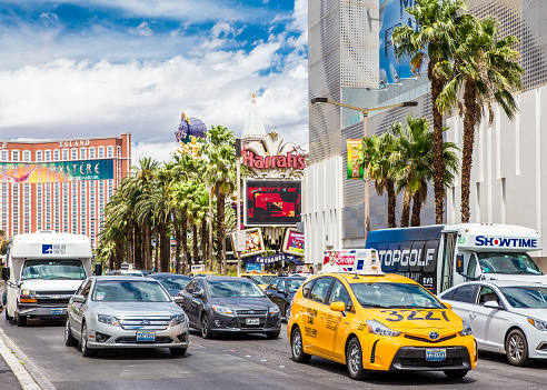 LAS VEGAS, NEVADA - MAY 17,  2017:  Trafficc along Las Vegas Boulevard with cars and resort casinos in view.