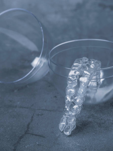 istock teeth aligners. Invisible brackets. Shine smile concept 1131849252