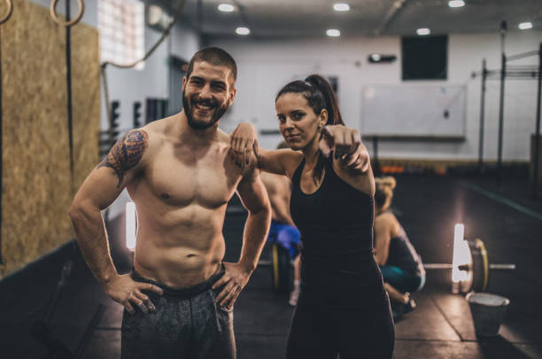 istock Friends relaxing after workout at the gym 1131849588