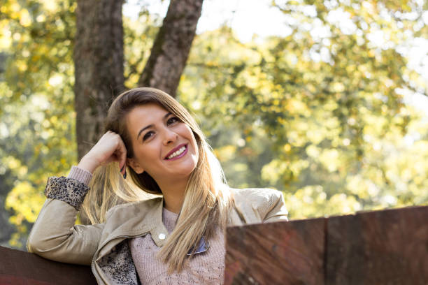 istock Woman sunny nature portrait 1131849973
