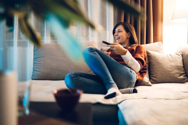 istock Watching TV in hotel room 1131850493