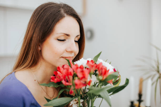 Woman with a bouquet of flowers enjoying her day