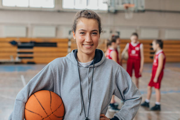 istock Female coach and basketball team 1131853814