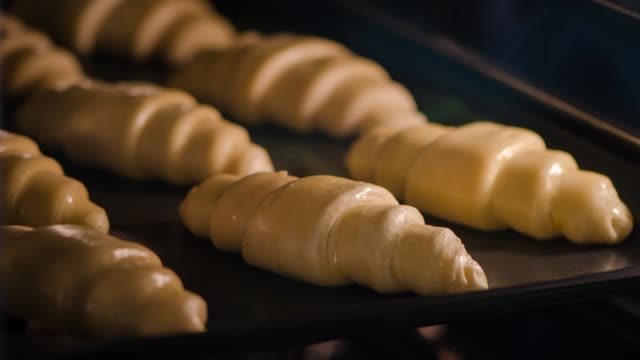 Timelapse video of Croissant baking in oven.