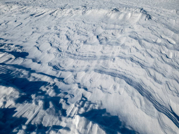 istock Patterns in the snow after a blizzard. Snow after a blizzard. Snow drift. 1131854669