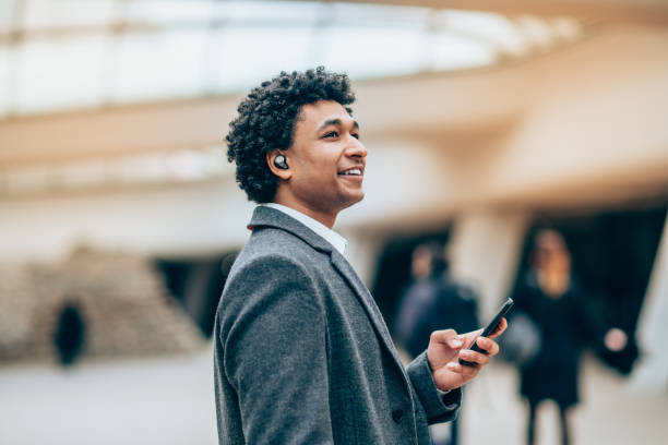 istock Portrait of modern man with Wireless earbuds 1131857412