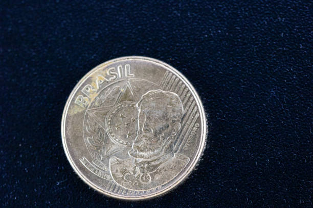 istock A super macro image of a twenty five cent real coin isolated on a black background 1131860447