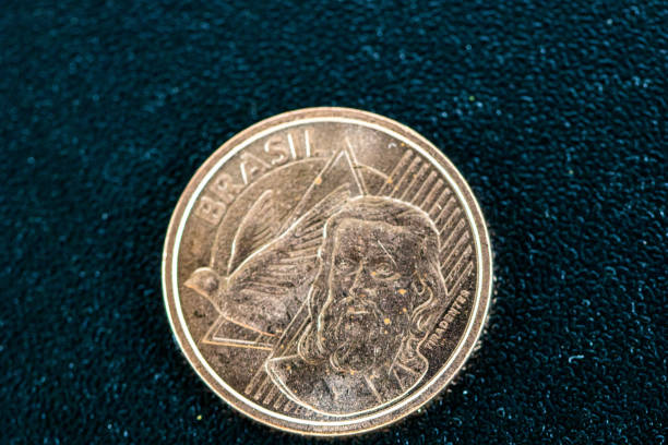istock A super macro image of a real five cents isolated on a black background 1131861007