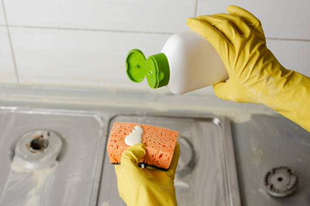 istock Extruding the detergent onto the sponge, close-up. 1131861543