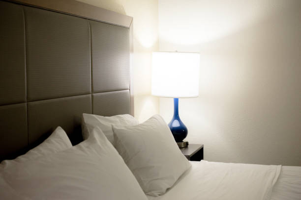 istock Bedroom bed and lamp 1131865099