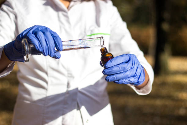 istock Female chemist with test tube 1131865159