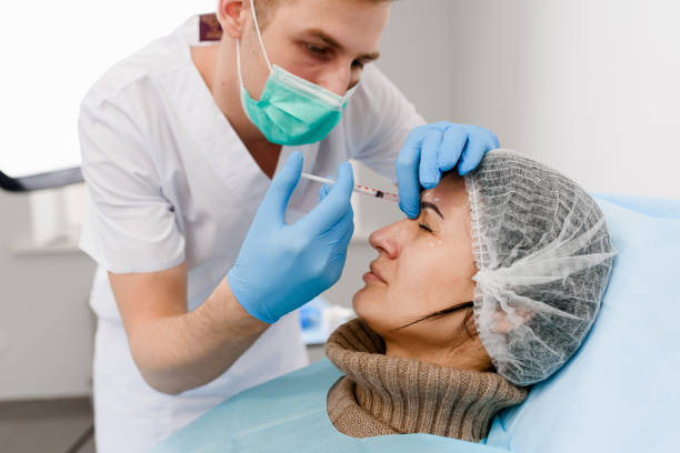 istock Botox injections. Botulinum toxin is a neurotoxic protein produced by the bacterium Clostridium botulinum and related species. 1131868182