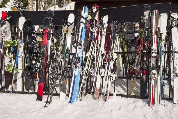 istock Group of skis and snowboards 1131868374