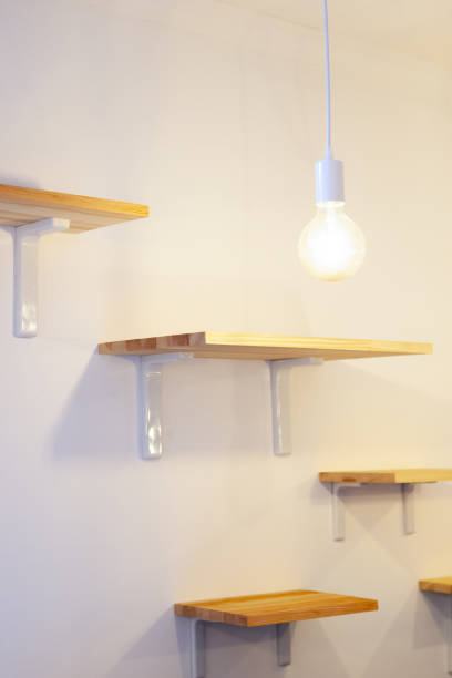 istock indoor shelves for cat at white wall background. 1131868613