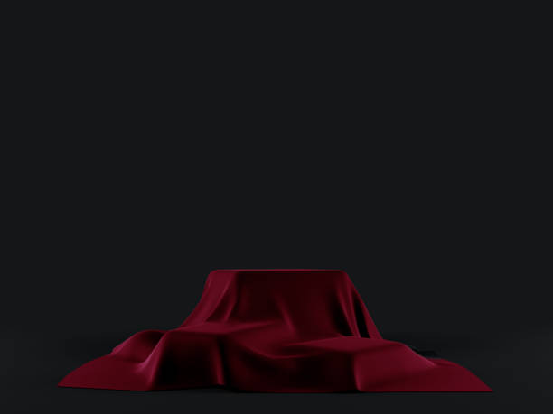 istock Empty stand or table with red tablecloth to show magic tricks. Product show. 1131870036