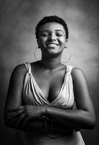 Portrait of a young brazilian black woman in studio.