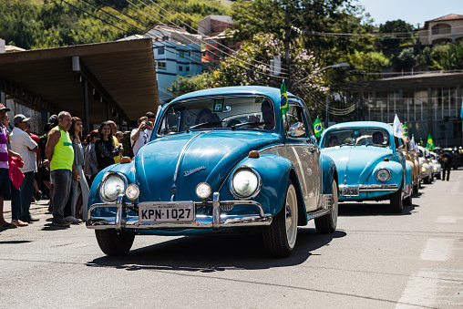Valença (Rio de Janeiro), Brazil - September 7, 2018: Parade of classic brazilian cars on the streets of Valença (south of the state of Rio de Janeiro) during the Brazil independence day celebrations.