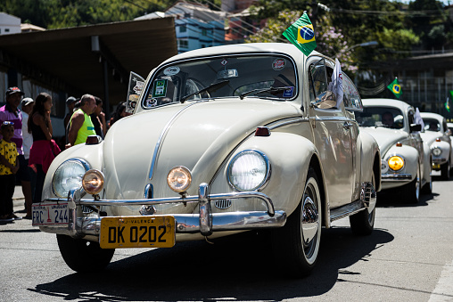 Valença (Rio de Janeiro), Brazil - September 7, 2018: Parade of classic brazilian cars on the streets of Valença (south of the state of Rio de Janeiro) during the Brazil independence day celebrations.