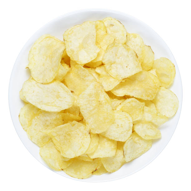 istock Potato chips in bowl isolated on white background 1131871721