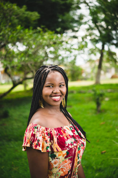 istock Young black woman with afro braids 1131873165
