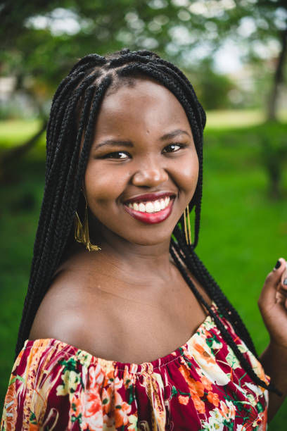 istock Young black woman with afro braids 1131873185