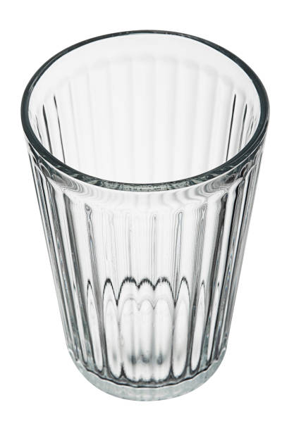 istock Empty faceted glass isolated on white background. 1131874014