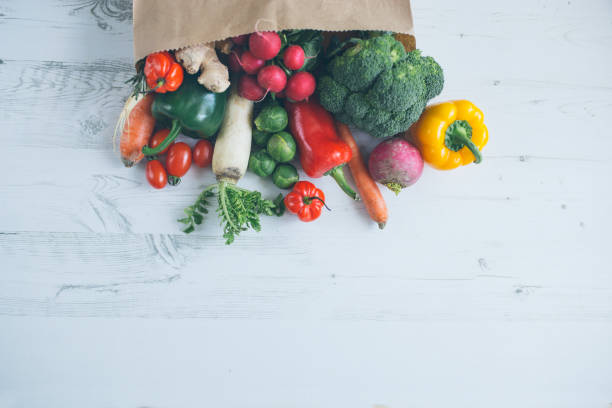 istock Fresh vegetables  in a grocery bag 1131874138