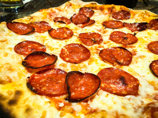 istock fresh italian pizza close up 1131874303
