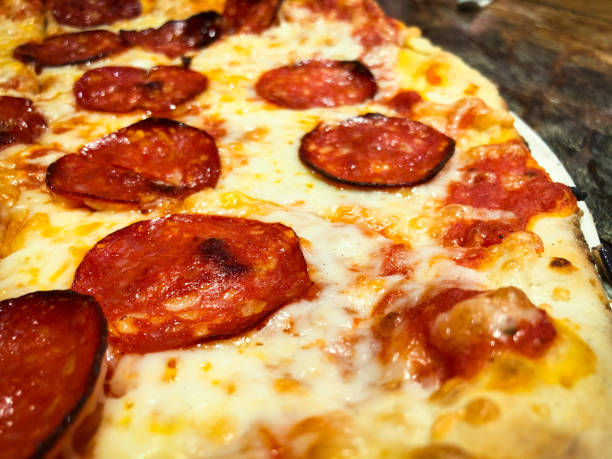 istock fresh italian pizza close up 1131874332