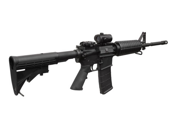 istock Modern black carbine with a collimator sight isolated on white back 1131878713