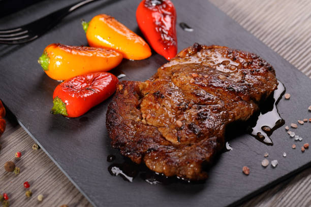 delicious ribeye steak with vegetables stock photo