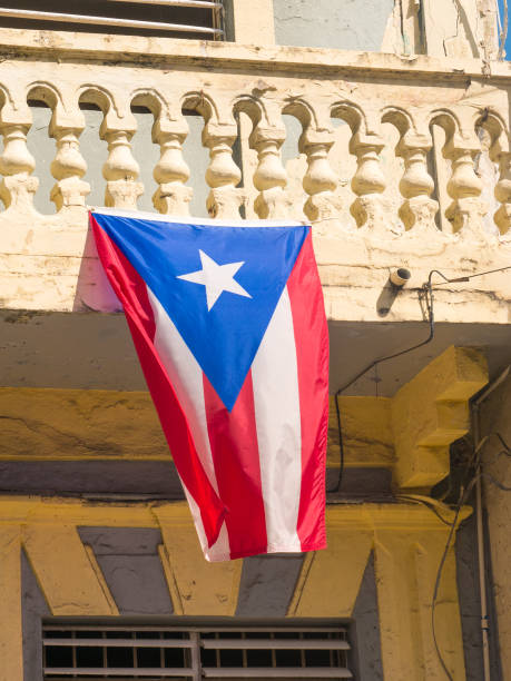 istock Puerto Rico flag on a old building 1131880241