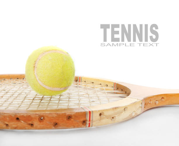 Close-Up Of Tennis Ball On Racket