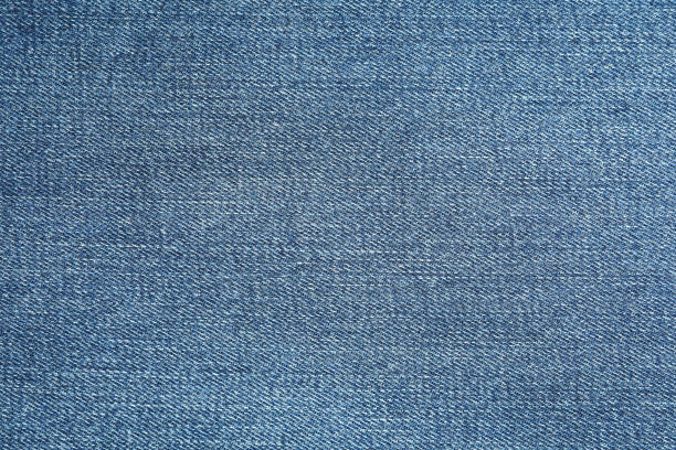 istock Texture of blue jeans as background, space for text 1131883548