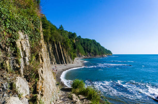 istock sea landscape is a pebbly beach with waves in white foam 1131883571