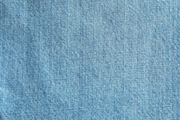istock Texture of blue jeans as background, space for text 1131883703