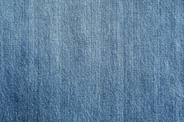 istock Texture of blue jeans as background, space for text 1131884447
