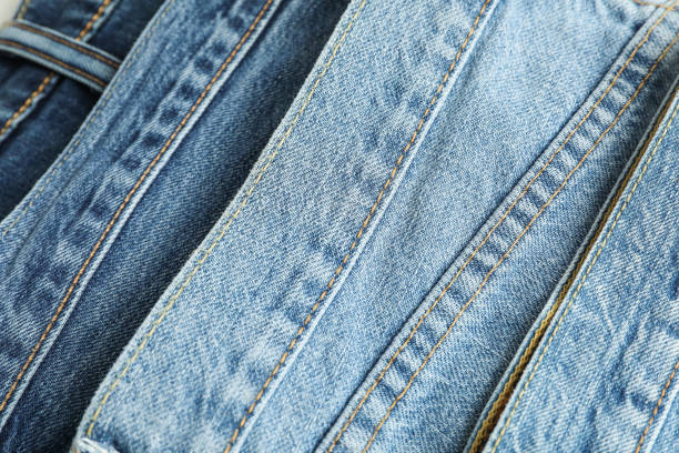 istock Jeans of different colors as background, space for text 1131884728